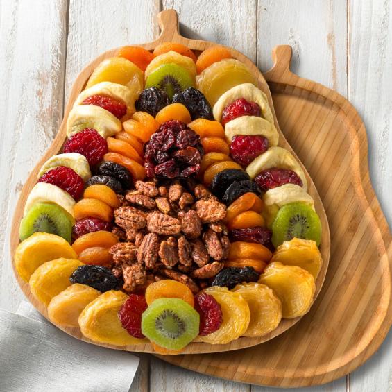 Festive Dried Fruit and Butter Toffee Pecans on Bamboo Pear Shaped Cutting Board
